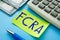 Business concept meaning FCRA Fair Credit Reporting ActÂ  with sign on the sheet